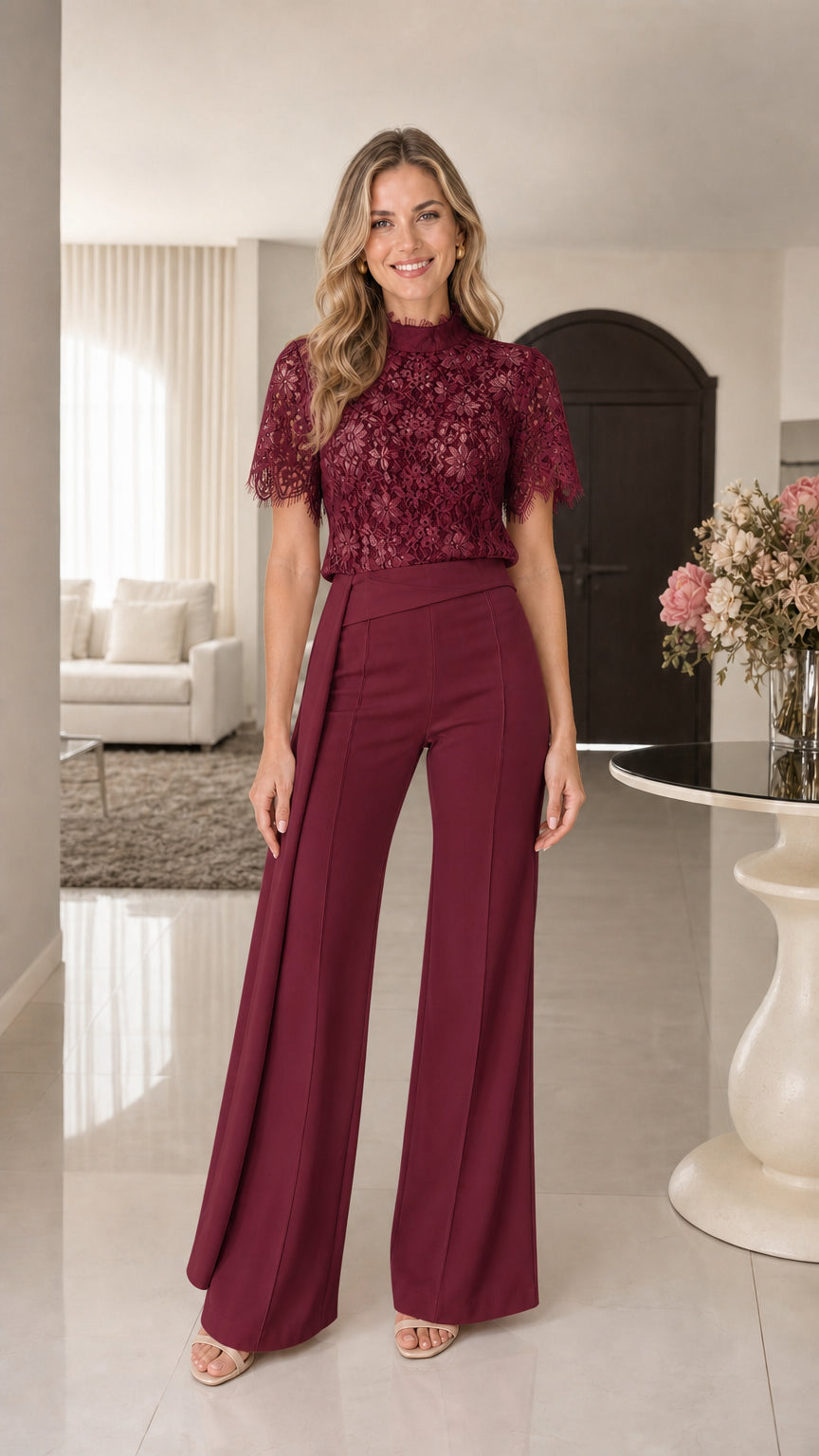 Model wearing Burgundy floral lace mock neck wide-leg jumpsuit