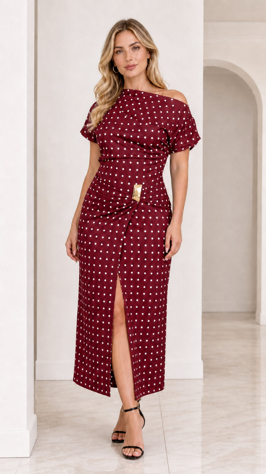 Model wearing burgundy red polka dot ruched midi dress with slit