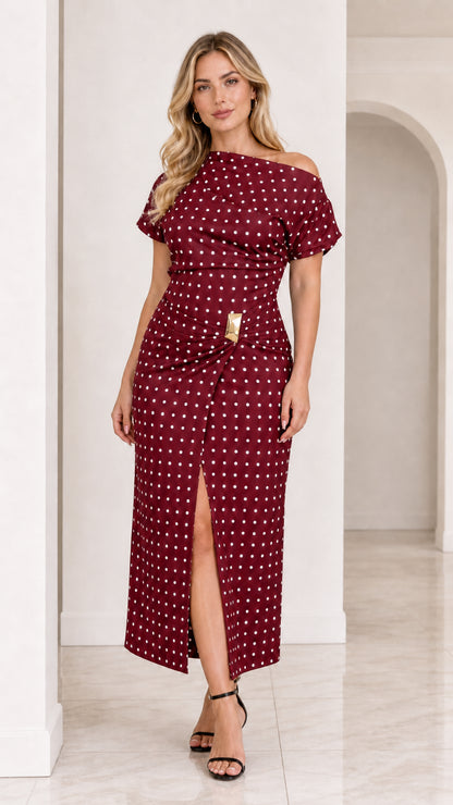 Model wearing burgundy red polka dot ruched midi dress with slit