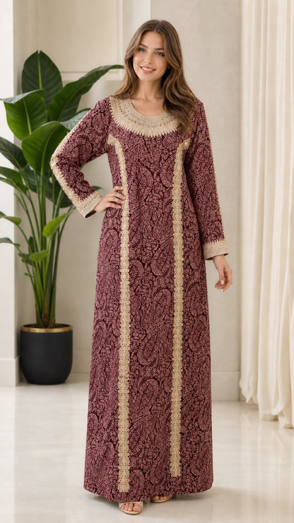 Model wearing burgundy red embroidered long sleeve kaftan maxi dress