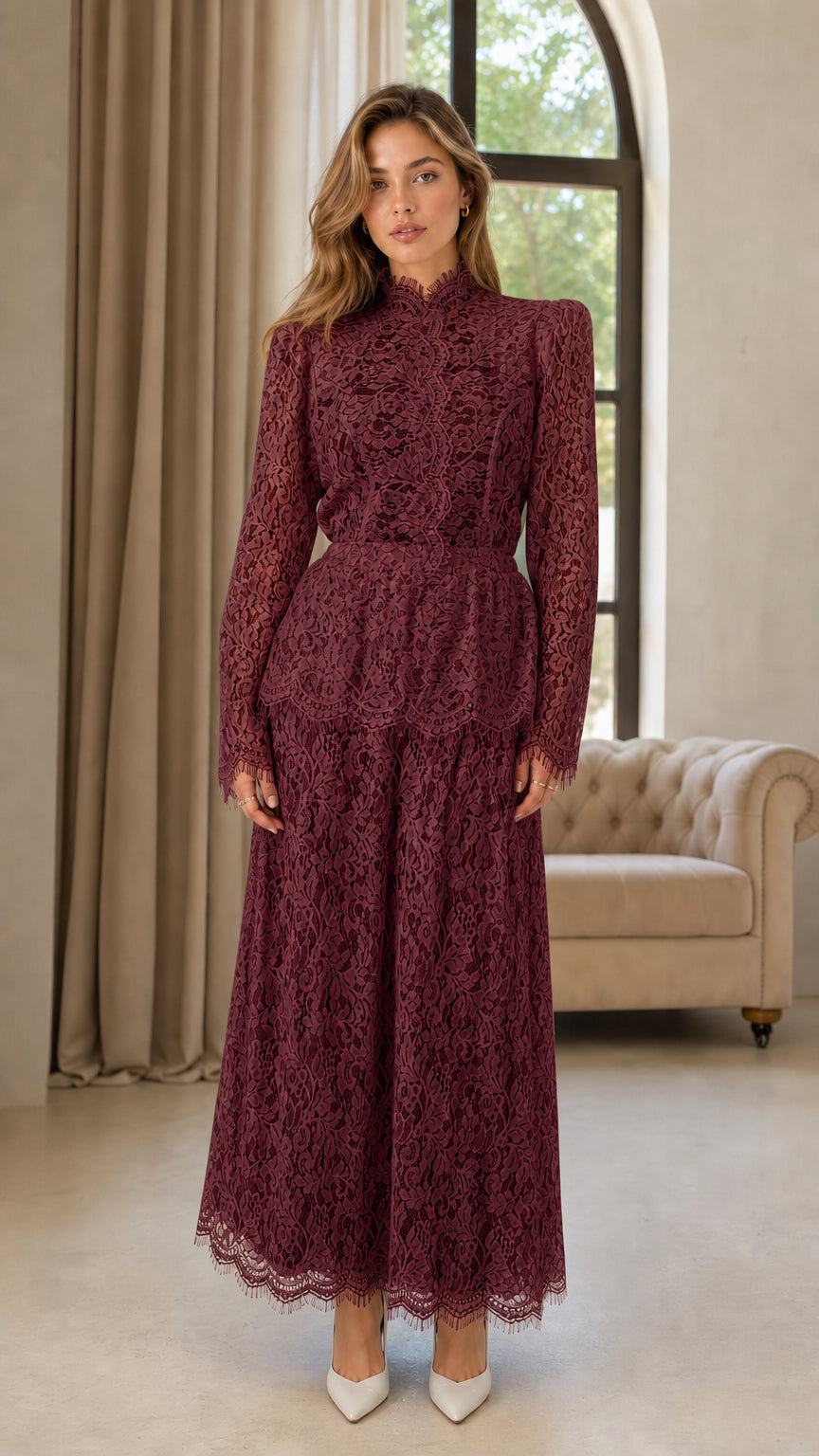 Front full view of woman wearing burgundy wine lace long sleeve jumpsuit