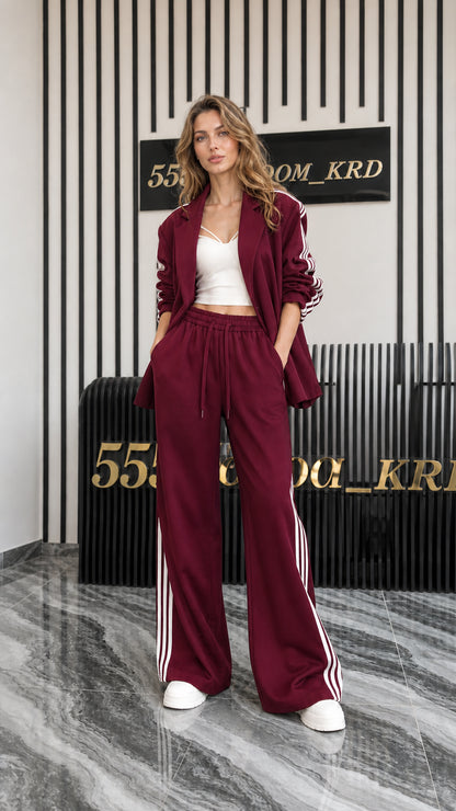 Full front view of women's burgundy 2-piece blazer and track pant set