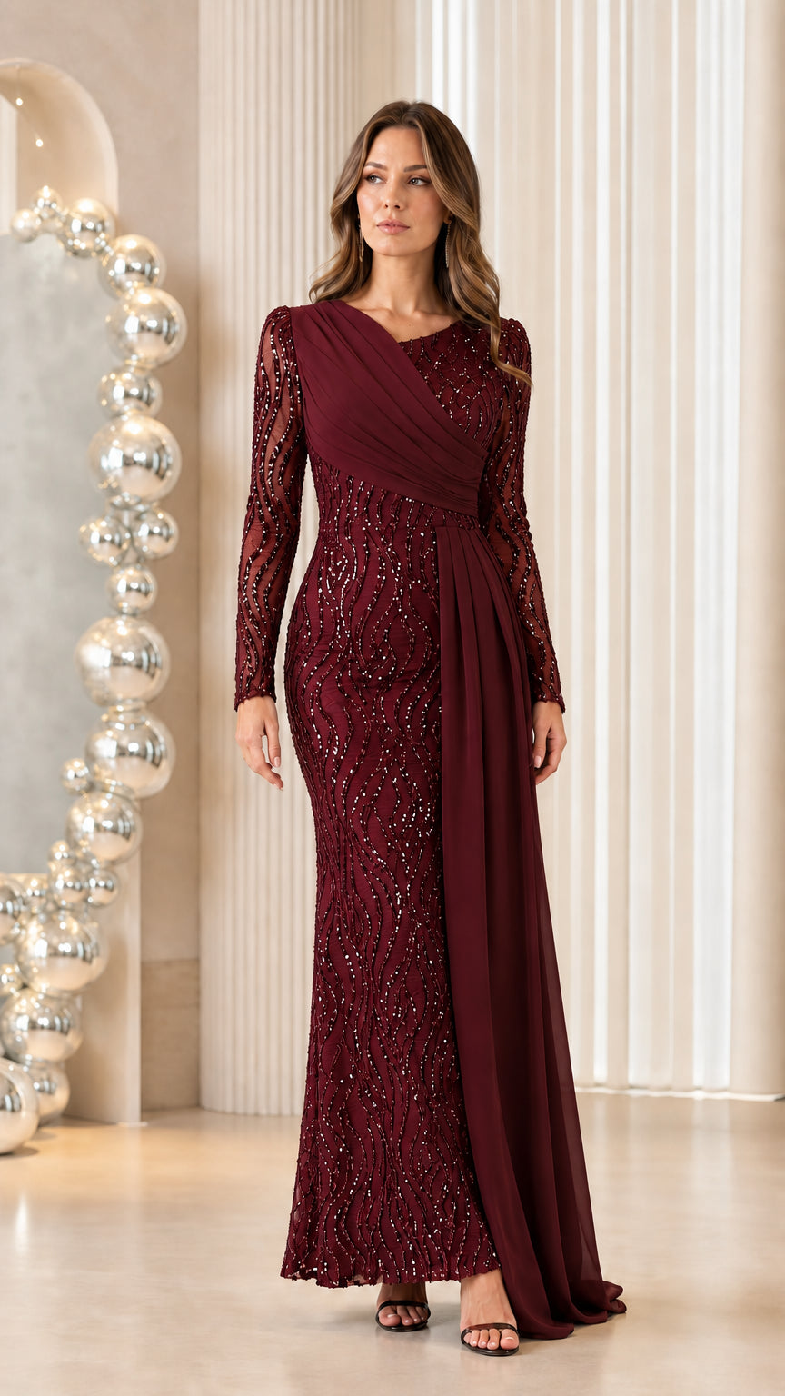 Front view of woman wearing burgundy wine sequined evening dress with cascading drape