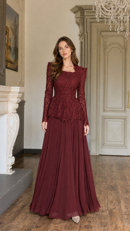Full-length view of Burgundy wine red lace peplum evening gown with pleated skirt