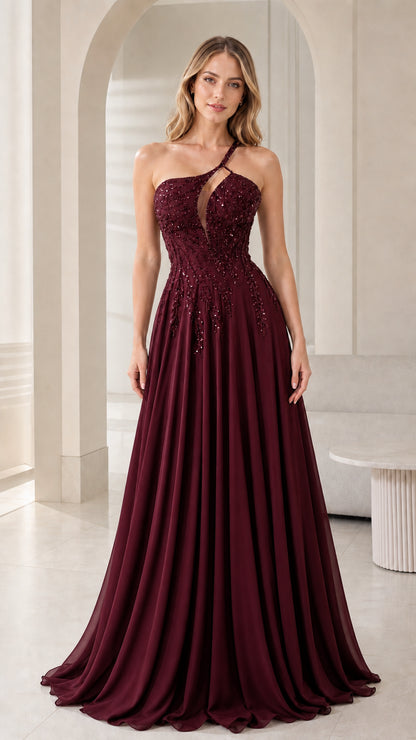 Front view of woman wearing burgundy wine one-shoulder beaded gown
