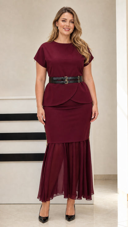 Model wearing burgundy red two-piece formal skirt set with belt