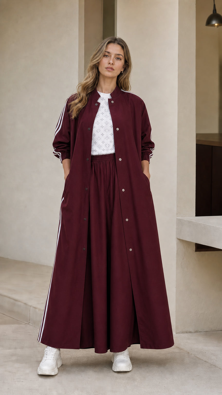 Woman wearing burgundy wine sporty maxi duster jacket and wide leg pants set