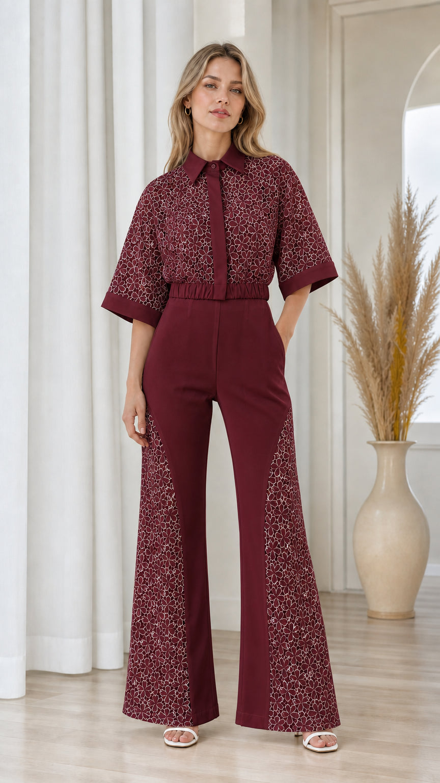 Model wearing burgundy red collared lace wide-leg jumpsuit