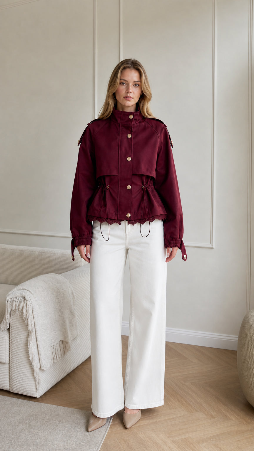Model wearing burgundy wine red cropped utility jacket with lace hem