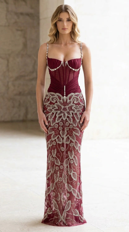 Front view of burgundy red embroidered corset formal evening gown