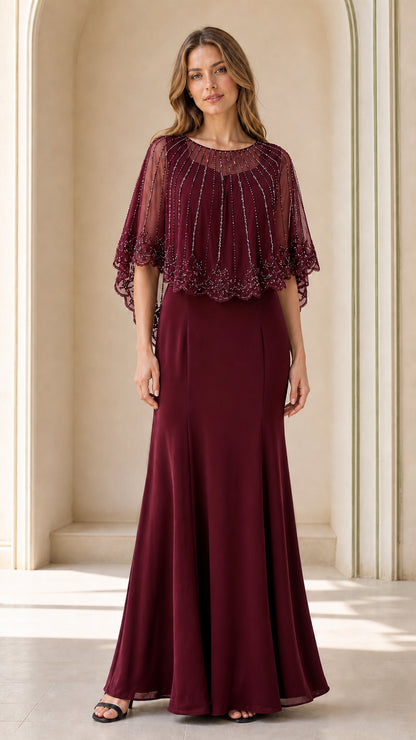 Full-length view of burgundy red beaded capelet formal dress