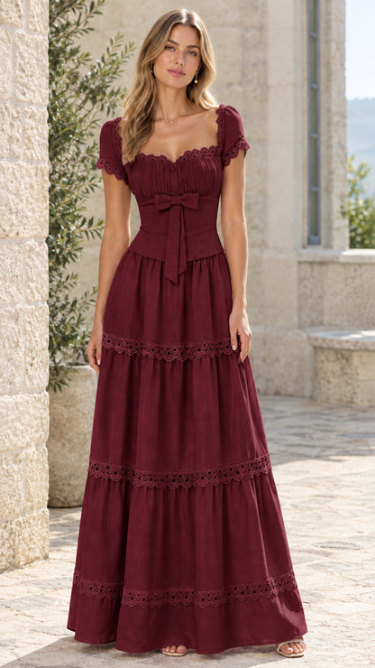Full-length view of woman wearing burgundy lace trim tiered maxi dress