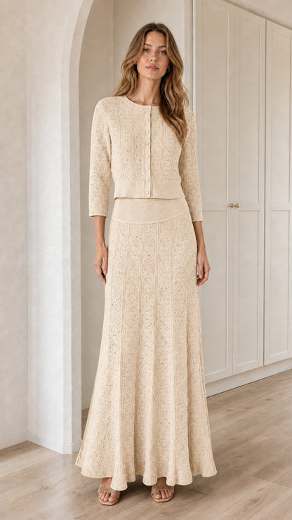 Model wearing Beige cream knit cardigan and maxi skirt two-piece set