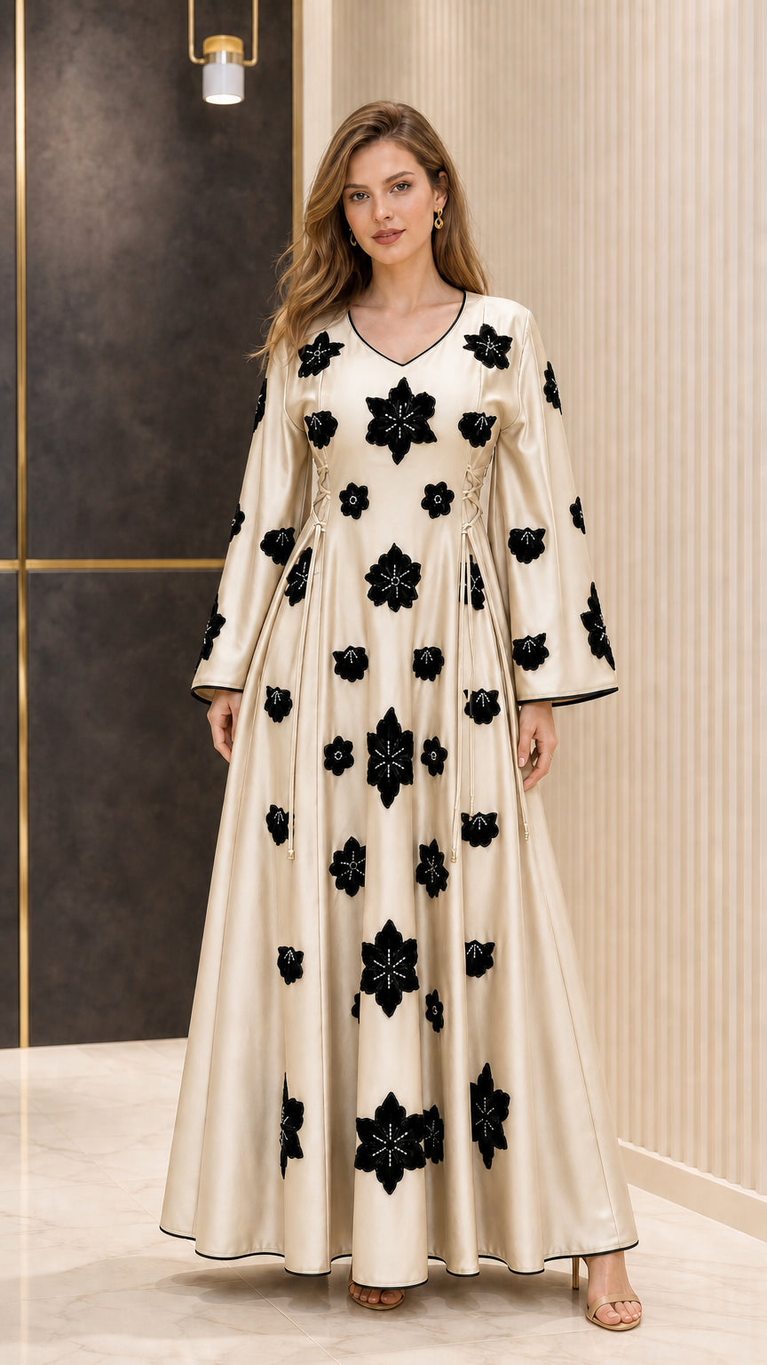 Full-length view of Champagne satin maxi dress with contrast black floral details