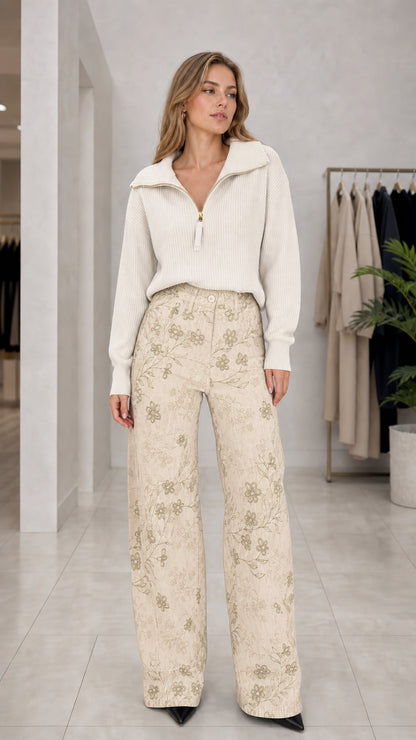 Full front view of Beige floral embroidered wide leg relaxed trousers