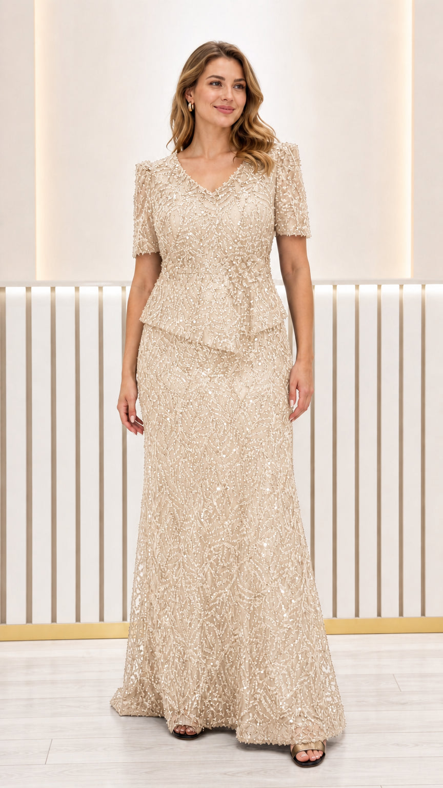 Front view of champagne gold sequined peplum formal maxi dress