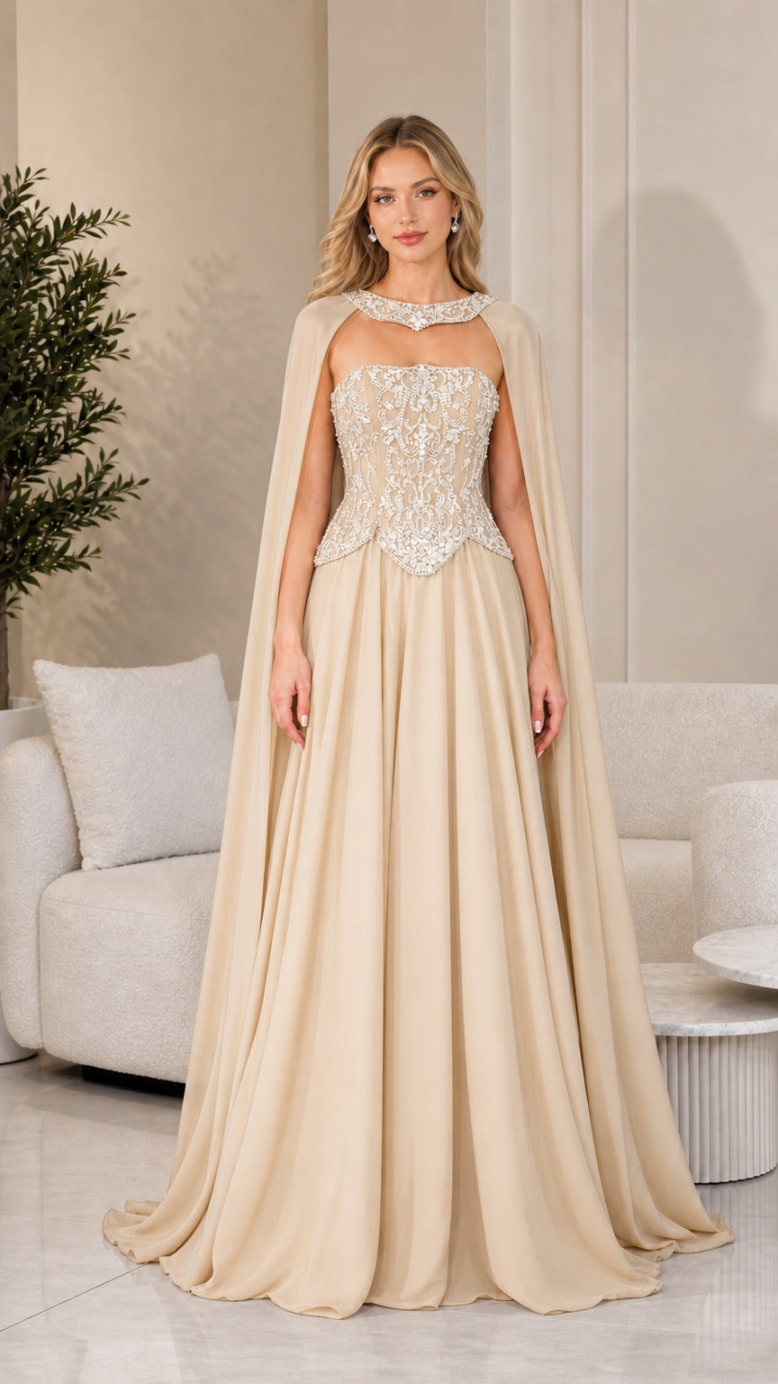 Front view of champagne beige evening dress with beaded corset and matching cape
