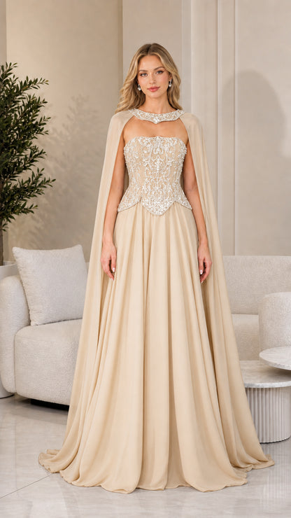 Front view of champagne beige evening dress with beaded corset and matching cape