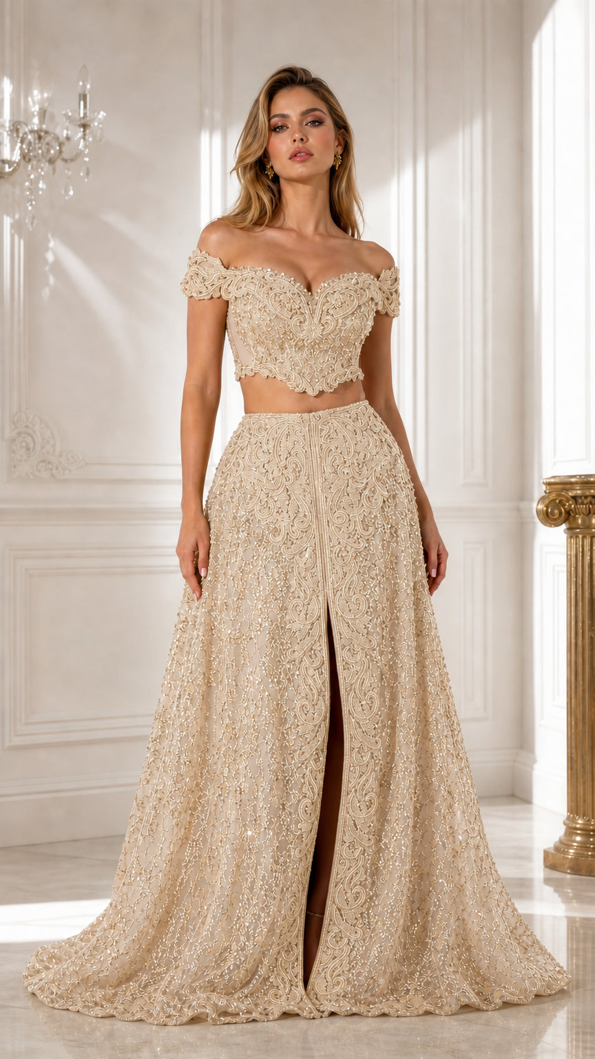 Front view of champagne ivory beaded two-piece formal maxi dress
