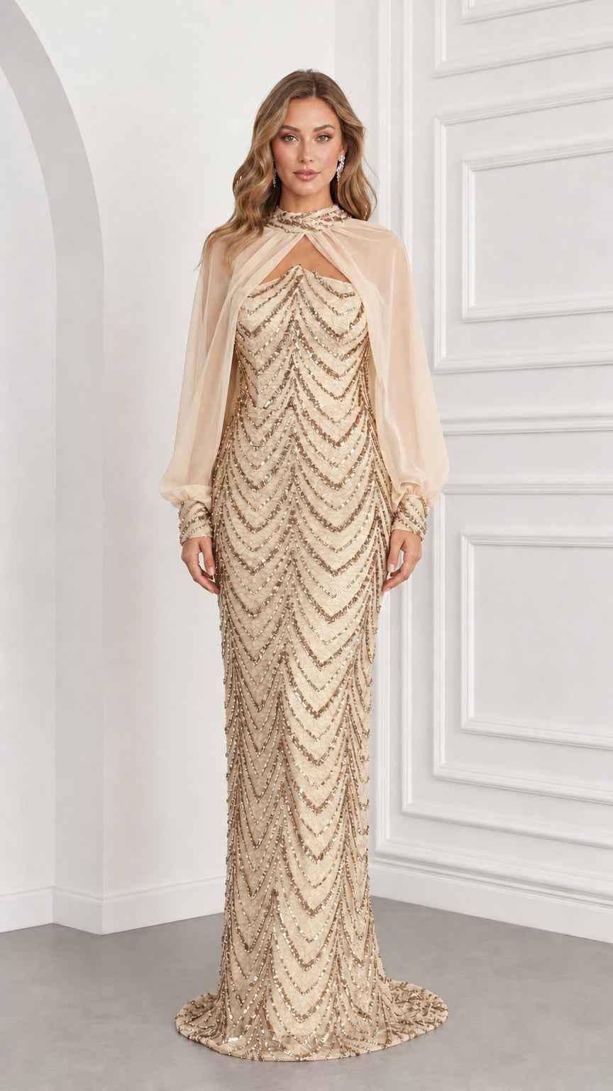 Front view of champagne gold sequined evening dress with sheer champagne capelet