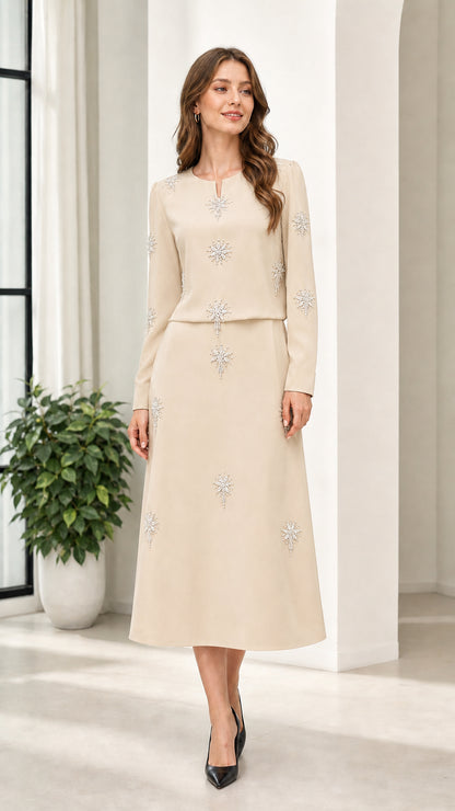 Beige champagne long sleeve rhinestone embellished midi dress on model