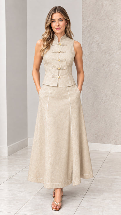 Front full-length view of woman wearing beige oatmeal mandarin collar vest and maxi skirt set