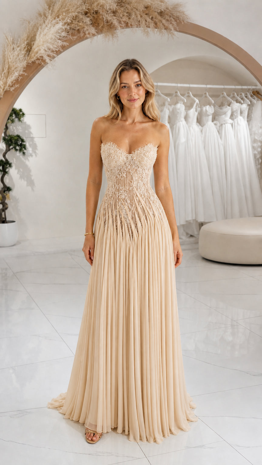 Front view of champagne strapless lace sweetheart pleated maxi gown