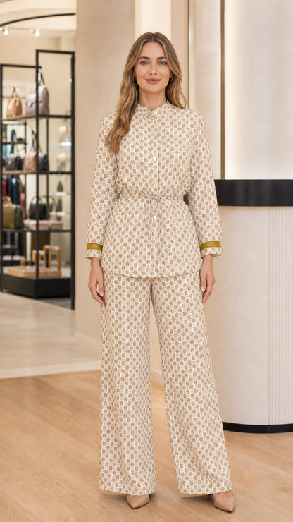 Model wearing Beige cream geometric print belted top and matching trousers