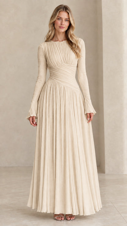 Model wearing champagne beige long sleeve pleated evening gown
