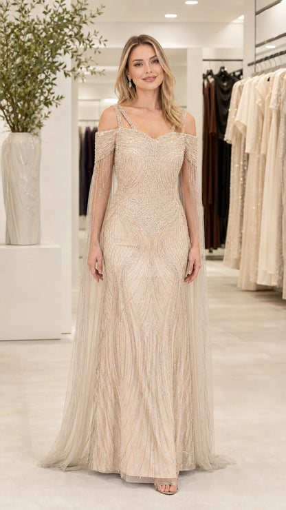 Front view of champagne gold beaded formal evening gown with sheer cape