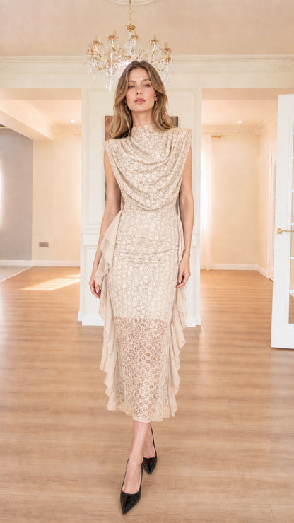 Model wearing champagne beige sleeveless cowl neck lace midi dress