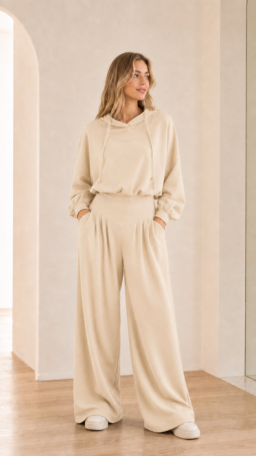 Full-body view of model wearing cream beige 2-piece wide-leg hoodie set
