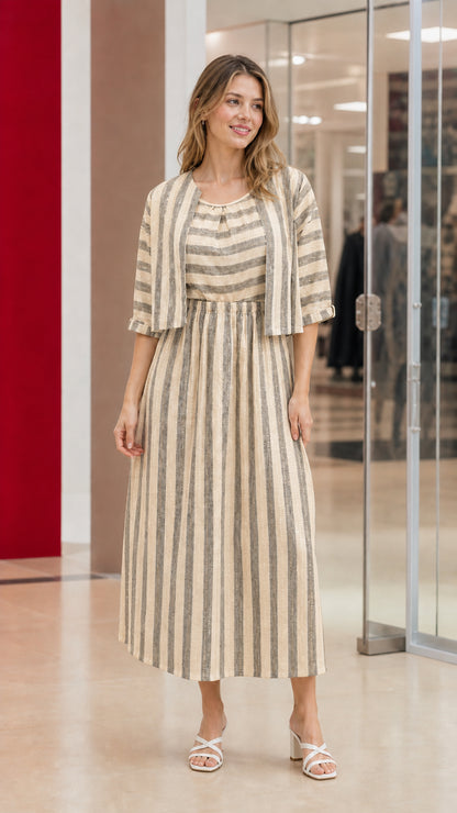 Woman wearing beige tan and white striped two-piece dress set