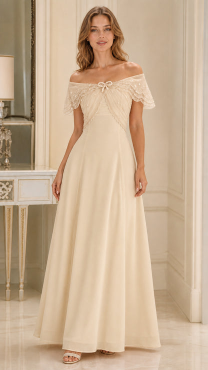 Front view of champagne ivory off-the-shoulder formal evening maxi gown
