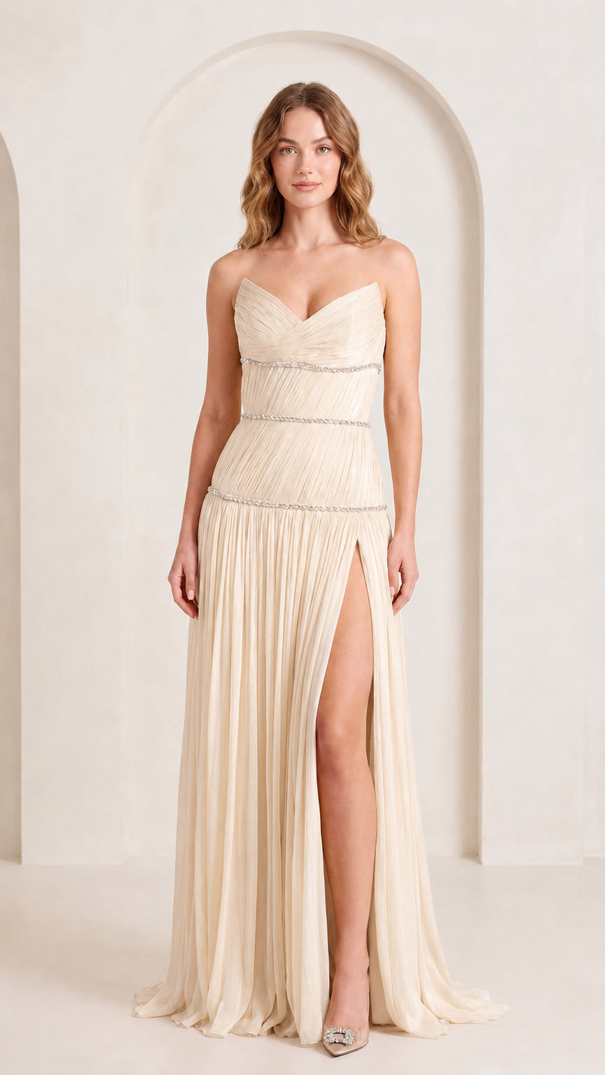 Front view of woman wearing champagne cream strapless pleated evening gown