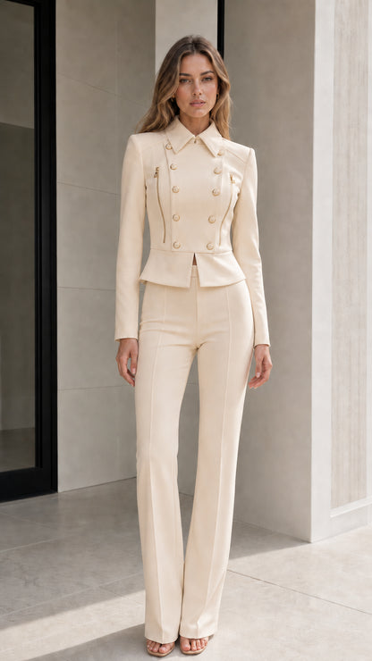 Model wearing beige cream double-breasted peplum blazer and flared trousers suit set