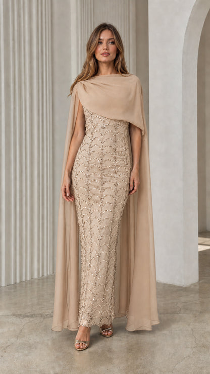 Champagne beige sequined column gown with cascading floor-length chiffon cape